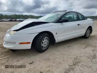 2000 Saturn SC with VIN 1G8ZP1283YZ160659, listed as a Copart auction lot 80305285 with Not provided miles and Clean title. Bid and sale history available at DreamBid. Image 1.