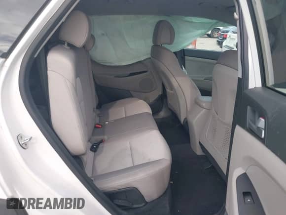 2016 Hyundai Tucson Sport with VIN KM8J33A22GU242249, listed as a IAAI auction lot 43444641 with 117,553 mi miles and . Bid and sale history available at DreamBid. Image 8.