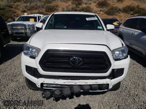 2021 Toyota Tacoma SR z VIN 5TFCZ5AN7MX267045, wystawiony jako Copart lot #65592105 z przebiegiem 40 992 mil mil oraz Szkoda całkowita • Salvage title. Historia ofert i sprzedaży dostępna na DreamBid. Obrazek 5.