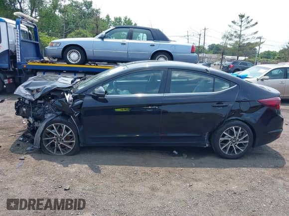 2020 Hyundai Elantra SEL with VIN KMHD84LF8LU071358, listed as a IAAI auction lot 42464528 with Not provided miles and . Bid and sale history available at DreamBid. Image 14.