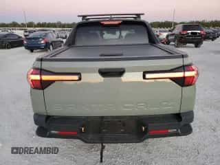 2023 Hyundai Santa Cruz SEL с VIN 5NTJC4AE7PH055234, выставлен на аукционе Copart как лот 82275634 с пробегом 21 873 миль миль и На запчасти • Non repairable. История ставок и продаж доступна на DreamBid. Изображение 6.