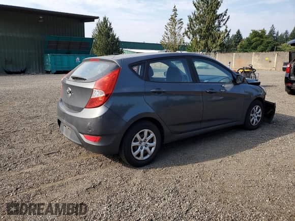 2012 Hyundai Accent GS with VIN KMHCT5AE7CU011159, listed as a Copart auction lot 70052815 with 156,055 mi miles and Salvage title. Bid and sale history available at DreamBid. Image 3.