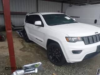 2018 Jeep Grand Cherokee Laredo z VIN 1C4RJFAG3JC499542, wystawiony jako IAAI lot #41963731 z przebiegiem 92 791 mil mil oraz . Historia ofert i sprzedaży dostępna na DreamBid. Obrazek 1.