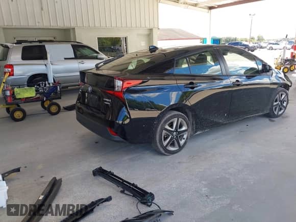2022 Toyota Prius L Eco with VIN JTDKAMFU7N3169400, listed as a IAAI auction lot 43446954 with 41,226 mi miles and . Bid and sale history available at DreamBid. Image 4.