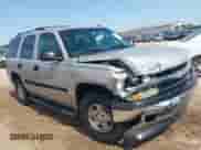 2005 Chevrolet Tahoe LT z VIN 1GNEC13T25J147583, wystawiony jako IAAI lot #42275971 z przebiegiem 244 307 mil mil oraz . Historia ofert i sprzedaży dostępna na DreamBid. Obrazek 1.