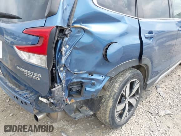 2020 Subaru Forester Touring with VIN JF2SKAXC2LH543897, listed as a IAAI auction lot 43149748 with 43,331 mi miles and . Bid and sale history available at DreamBid. Image 21.