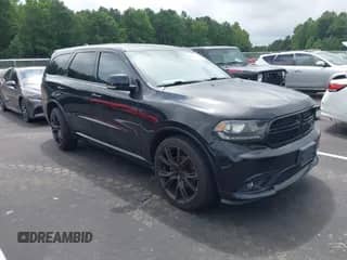 2014 Dodge Durango R/T with VIN 1C4SDHCT2EC313395, listed as a IAAI auction lot 42958438 with 113,110 mi miles and . Bid and sale history available at DreamBid. Image 1.