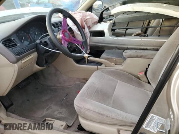 1995 Honda Accord LX z VIN 1HGCD5638SA151859, wystawiony jako Copart lot #85007704 z przebiegiem 137 901 mil mil oraz Szkoda całkowita • Salvage title. Historia ofert i sprzedaży dostępna na DreamBid. Obrazek 7.