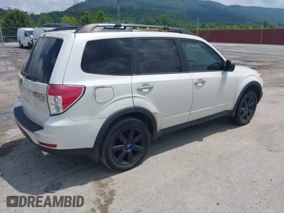 2011 Subaru Forester X Premium with VIN JF2SHADC8BG702459, listed as a IAAI auction lot 42683799 with 189,175 mi miles and . Bid and sale history available at DreamBid. Image 4.