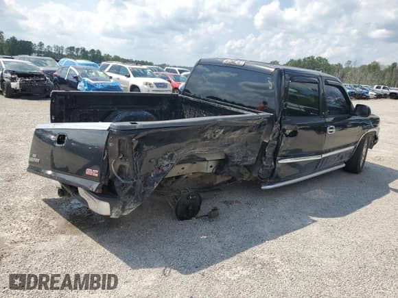 2005 GMC Sierra 1500 SLT z VIN 2GTEC13T351389897, wystawiony jako Copart lot #56167155 z przebiegiem 308 224 mil mil oraz Szkoda całkowita • Salvage title. Historia ofert i sprzedaży dostępna na DreamBid. Obrazek 3.