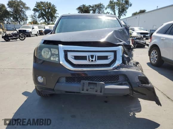 2011 Honda Pilot Touring with VIN 5FNYF3H9XBB041665, listed as a Copart auction lot 70728095 with 198,665 mi miles and Salvage title. Bid and sale history available at DreamBid. Image 5.