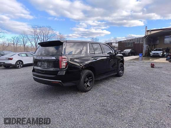 2022 Chevrolet Tahoe Commercial with VIN 1GNSKLED9NR309069, listed as a Copart auction lot 87458924 with 9,208 mi miles and Clean title. Bid and sale history available at DreamBid. Image 4.