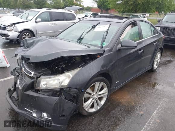 2012 Chevrolet Cruze LTZ with VIN 1G1PH5SC1C7263954, listed as a IAAI auction lot 43040842 with Not provided miles and . Bid and sale history available at DreamBid. Image 2.