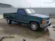 1998 Chevrolet Silverado 1500 with VIN 1GCEC14R9WZ161169, listed as a Copart auction lot 65908815 with 106,967 mi miles and Salvage title. Bid and sale history available at DreamBid. Image 4.
