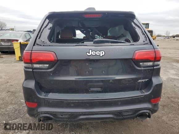 2016 Jeep Grand Cherokee SRT с VIN 1C4RJFDJ3GC441110, выставлен на аукционе Copart как лот 72684324 с пробегом Не указан миль и Списание • Salvage title. История ставок и продаж доступна на DreamBid. Изображение 6.