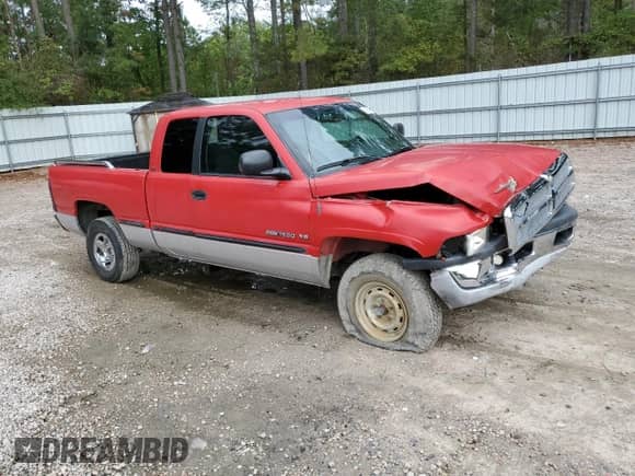 1999 Dodge 1500 z VIN 1B7HC13Y2XJ522358, wystawiony jako Copart lot #84297595 z przebiegiem 322 384 mil mil oraz Szkoda całkowita • Salvage title. Historia ofert i sprzedaży dostępna na DreamBid. Obrazek 4.