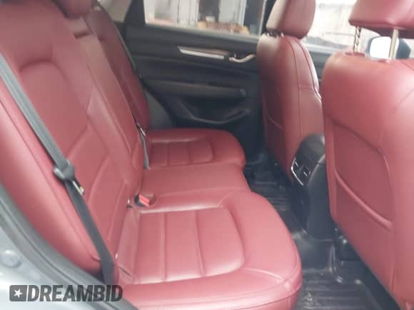 2022 Mazda CX-5 S Carbon Edition z VIN JM3KFBCM9N1538707, wystawiony jako IAAI lot #42026877 z przebiegiem 36 077 mil mil oraz . Historia ofert i sprzedaży dostępna na DreamBid. Obrazek 8.