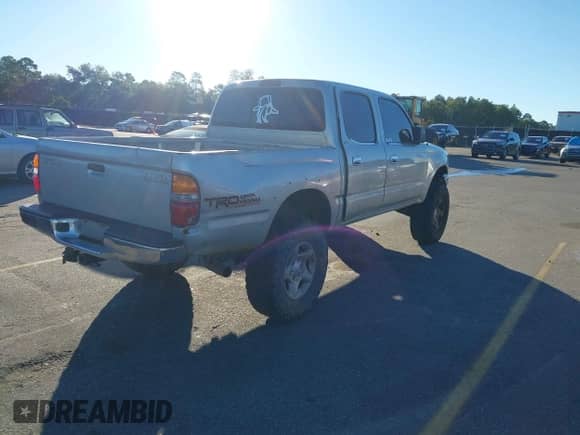 2004 Toyota Tacoma PreRunner with VIN 5TEGN92N74Z318636, listed as a IAAI auction lot 43482050 with 308,025 mi miles and . Bid and sale history available at DreamBid. Image 4.