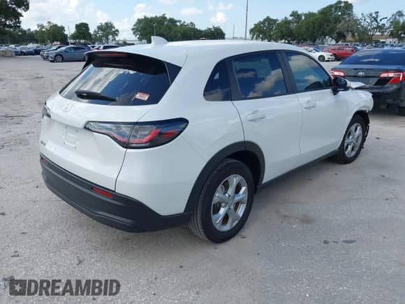 2025 Honda HR-V LX with VIN 3CZRZ1H31SM726848, listed as a IAAI auction lot 42785818 with 7,039 mi miles and . Bid and sale history available at DreamBid. Image 4.