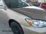 2004 Toyota Camry LE z VIN 4T1BE32K34U291565, wystawiony jako IAAI lot #42818319 z przebiegiem 59 993 mil mil oraz . Historia ofert i sprzedaży dostępna na DreamBid. Obrazek 14.