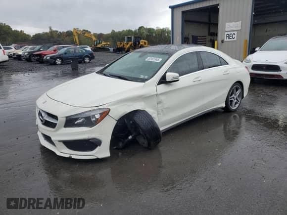 2014 Mercedes-Benz CLA 250 with VIN WDDSJ4GB1EN114111, listed as a Copart auction lot 82165945 with 63,740 mi miles and Salvage title. Bid and sale history available at DreamBid. Image 1.