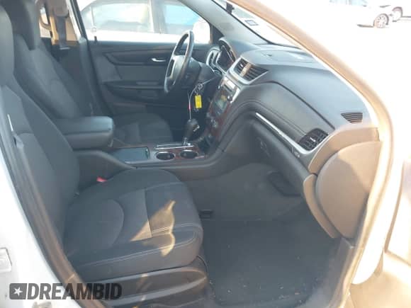 2013 Chevrolet Traverse LT z VIN 1GNKRGKD6DJ122960, wystawiony jako IAAI lot #42909542 z przebiegiem 266 289 mil mil oraz . Historia ofert i sprzedaży dostępna na DreamBid. Obrazek 5.