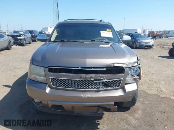 2011 Chevrolet Tahoe LT with VIN 1GNSCBE00BR397882, listed as a IAAI auction lot 42818583 with 191,303 mi miles and . Bid and sale history available at DreamBid. Image 12.