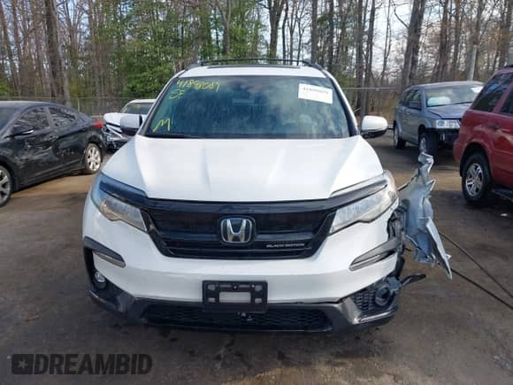 2021 Honda Pilot Black Edition z VIN 5FNYF6H71MB030752, wystawiony jako IAAI lot #41898089 z przebiegiem 87 840 mil mil oraz . Historia ofert i sprzedaży dostępna na DreamBid. Obrazek 12.