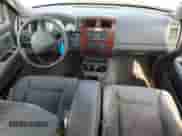 2005 Dodge Dakota SLT z VIN 1D7HW48K05S310312, wystawiony jako Copart lot #88061125 z przebiegiem 208 806 mil mil oraz Nie do naprawy • Non repairable. Historia ofert i sprzedaży dostępna na DreamBid. Obrazek 8.