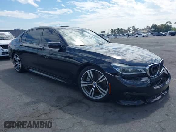 2016 BMW 7 Series 750i xDrive with VIN WBA7F2C5XGG415731, listed as a IAAI auction lot 43302211 with 113,001 mi miles and . Bid and sale history available at DreamBid. Image 1.