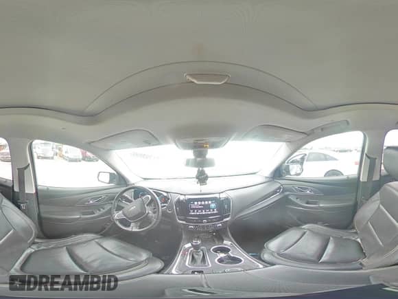 2018 Chevrolet Traverse Premier z VIN 1GNERKKW9JJ100786, wystawiony jako Copart lot #71393895 z przebiegiem 162 859 mil mil oraz Szkoda całkowita • Salvage title. Historia ofert i sprzedaży dostępna na DreamBid. Obrazek 14.