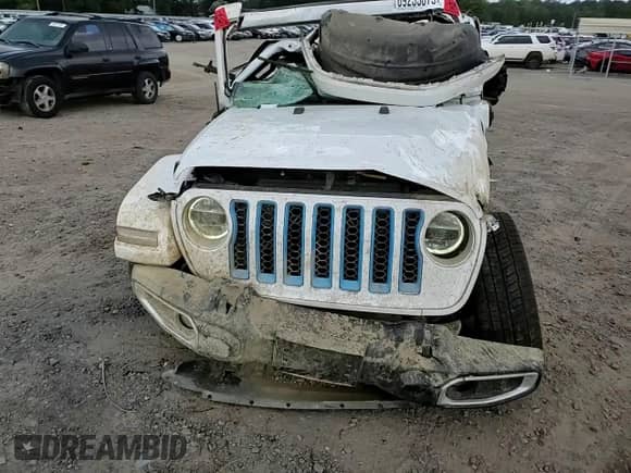 2021 Jeep Wrangler Unlimited Sahara with VIN 1C4JJXP64MW682744, listed as a Copart auction lot 69235075 with 65,533 mi miles and Salvage title. Bid and sale history available at DreamBid. Image 13.