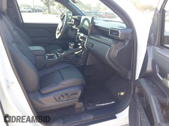 2024 Toyota Tacoma SR5 with VIN 3TYLB5JN9RT049484, listed as a IAAI auction lot 43107514 with 10,129 mi miles and . Bid and sale history available at DreamBid. Image 5.