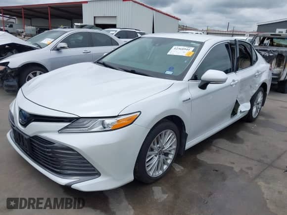 2020 Toyota Camry Hybrid XLE with VIN 4T1F31AK6LU540730, listed as a IAAI auction lot 42368941 with 91,035 mi miles and . Bid and sale history available at DreamBid. Image 2.