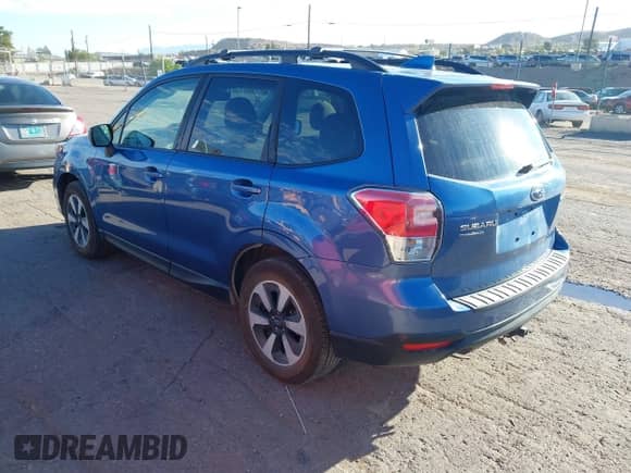 2018 Subaru Forester Premium z VIN JF2SJADC3JH520763, wystawiony jako IAAI lot #43359046 z przebiegiem 101 387 mil mil oraz . Historia ofert i sprzedaży dostępna na DreamBid. Obrazek 3.