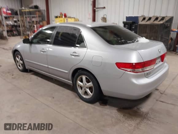 2003 Honda Accord EX z VIN JHMCM55623C053506, wystawiony jako IAAI lot #41572271 z przebiegiem 199 802 mil mil oraz . Historia ofert i sprzedaży dostępna na DreamBid. Obrazek 3.