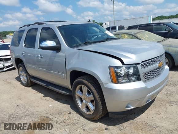 2014 Chevrolet Tahoe LT with VIN 1GNSCBE04ER147792, listed as a IAAI auction lot 42781257 with 136,462 mi miles and . Bid and sale history available at DreamBid. Image 1.