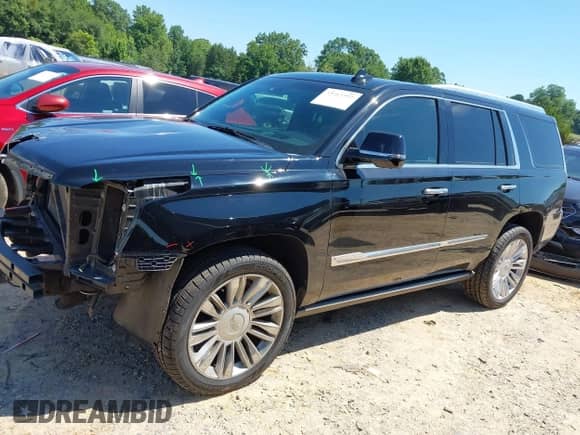 2015 Cadillac Escalade Platinum z VIN 1GYS4PKJ6FR695160, wystawiony jako IAAI lot #42664381 z przebiegiem 135 569 mil mil oraz . Historia ofert i sprzedaży dostępna na DreamBid. Obrazek 14.