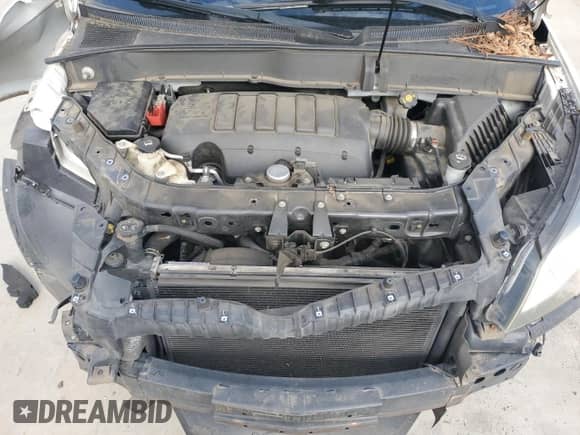 2014 Chevrolet Traverse LT с VIN 1GNKRGKD2EJ319951, выставлен на аукционе Copart как лот 84435595 с пробегом 123 719 миль миль и Списание • Salvage title. История ставок и продаж доступна на DreamBid. Изображение 12.