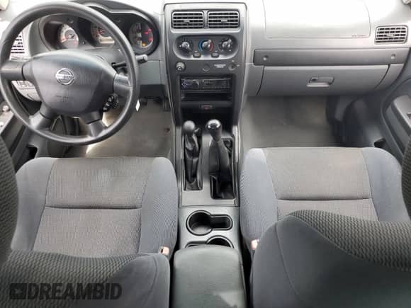 2004 Nissan Frontier XE Desert Runner z VIN 1N6ED26Y44C462503, wystawiony jako Copart lot #65923265 z przebiegiem 138 884 mil mil oraz Nie do naprawy • Non repairable. Historia ofert i sprzedaży dostępna na DreamBid. Obrazek 8.