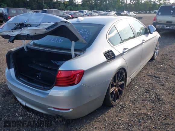 2014 BMW 5 Series 535i xDrive with VIN WBA5B3C57ED537633, listed as a IAAI auction lot 43073450 with Not provided miles and . Bid and sale history available at DreamBid. Image 4.