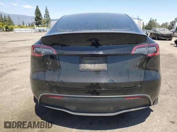 2023 Tesla Model Y Performance с VIN 7SAYGDEF3PF978879, выставлен на аукционе Copart как лот 67779005 с пробегом 46 825 миль миль и Списание • Salvage title. История ставок и продаж доступна на DreamBid. Изображение 6.