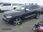 2013 Jeep Grand Cherokee Limited z VIN 1C4RJFBT4DC503856, wystawiony jako IAAI lot #43166356 z przebiegiem 143 262 mil mil oraz . Historia ofert i sprzedaży dostępna na DreamBid. Obrazek 17.