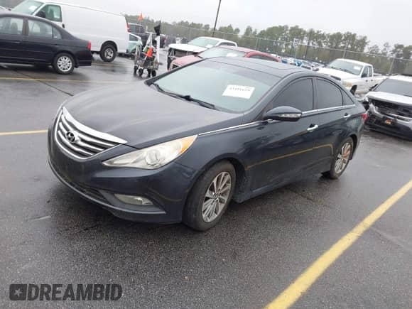 2014 Hyundai Sonata Limited z VIN 5NPEC4AB1EH935770, wystawiony jako IAAI lot #43491629 z przebiegiem 159 047 mil mil oraz . Historia ofert i sprzedaży dostępna na DreamBid. Obrazek 2.