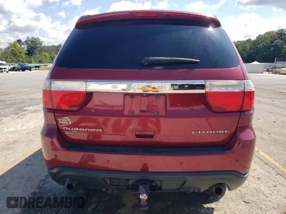 2013 Dodge Durango Citadel with VIN 1C4SDJET8DC605894, listed as a Copart auction lot 69955665 with 143,470 mi miles and Salvage title. Bid and sale history available at DreamBid. Image 6.