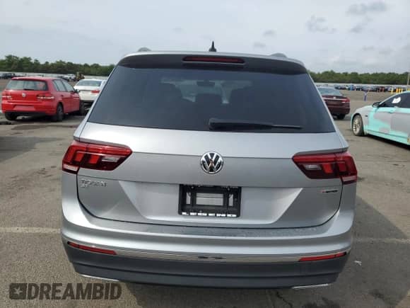 2021 Volkswagen Tiguan SE с VIN 3VV2B7AX7MM118770, выставлен на аукционе Copart как лот 82082155 с пробегом 80 787 миль миль и Списание • Salvage title. История ставок и продаж доступна на DreamBid. Изображение 6.
