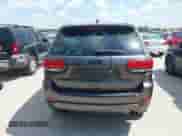2018 Jeep Grand Cherokee Laredo E with VIN 1C4RJEAG6JC304365, listed as a IAAI auction lot 43023758 with 140,626 mi miles and . Bid and sale history available at DreamBid. Image 16.