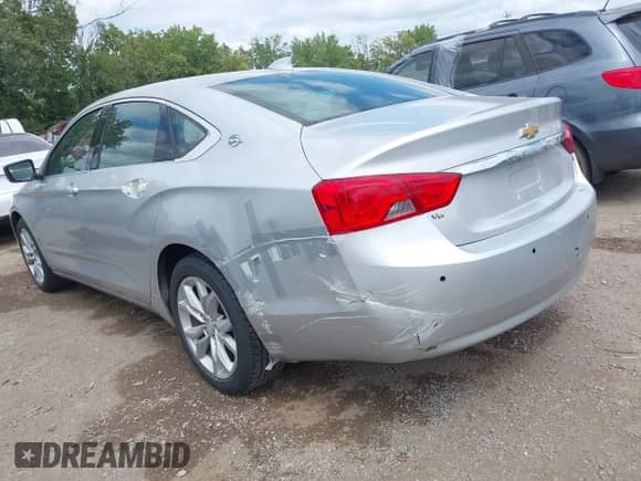 2016 Chevrolet Impala LT with VIN 2G1115S33G9153180, listed as a IAAI auction lot 43065437 with 169,401 mi miles and . Bid and sale history available at DreamBid. Image 3.