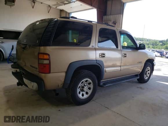 2000 Chevrolet Tahoe LS with VIN 1GNEK13T3YJ128290, listed as a Copart auction lot 61962605 with 226,389 mi miles and Salvage title. Bid and sale history available at DreamBid. Image 3.