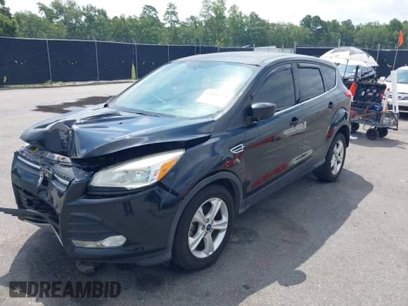 2014 Ford Escape SE with VIN 1FMCU0GX0EUB38816, listed as a IAAI auction lot 42818759 with 137,550 mi miles and . Bid and sale history available at DreamBid. Image 17.
